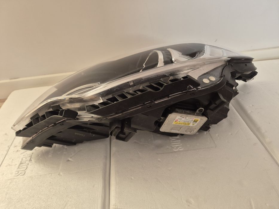 Kia Optima reflektor lewy xenon