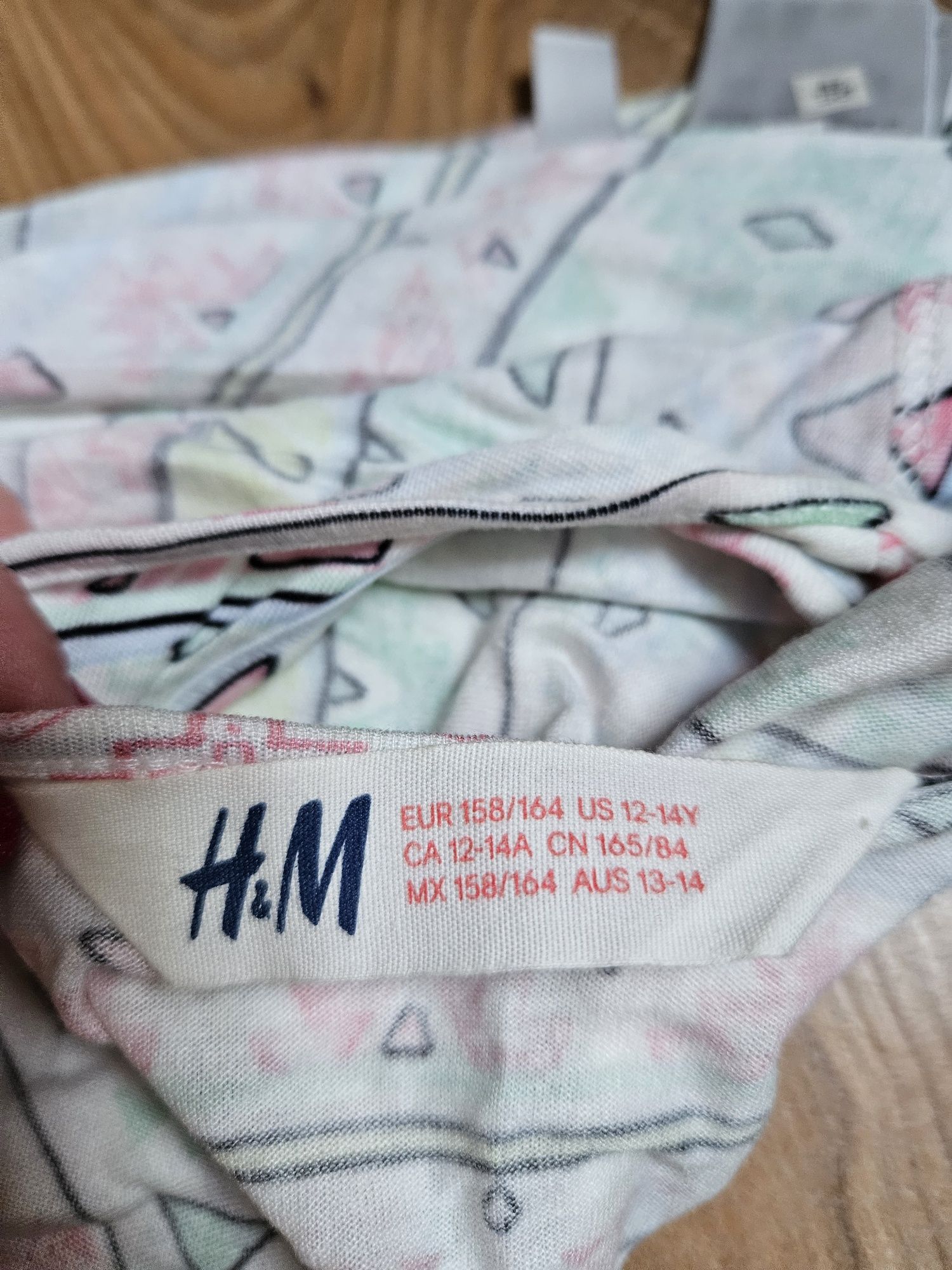 Wzorzysta pastelowa sukienka na lato, H&M, 158/164