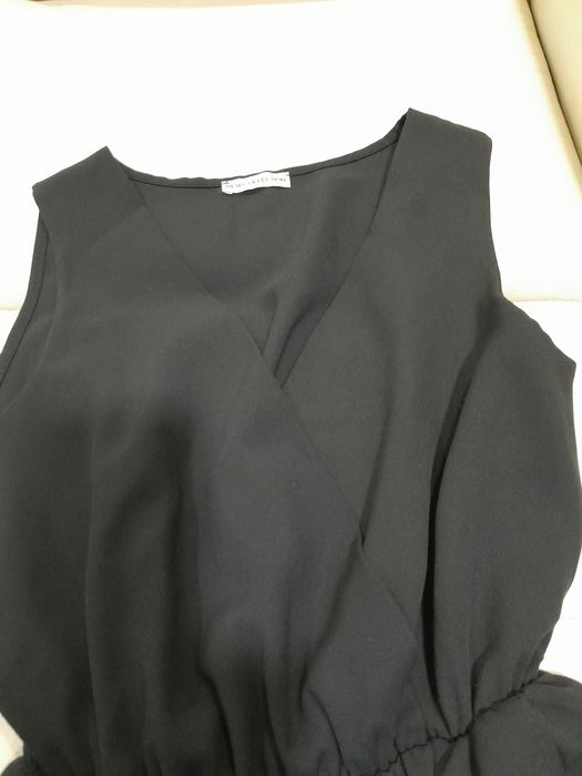 Macacão preto sem manga