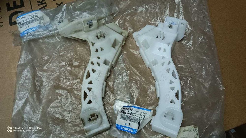 Кріплення бампера переднього MAZDA Кронштейн внешний Левый и Правый