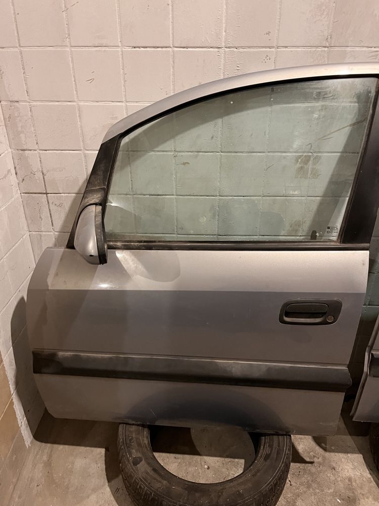 Opel zafira b drzwi lewe przód tył kompletne