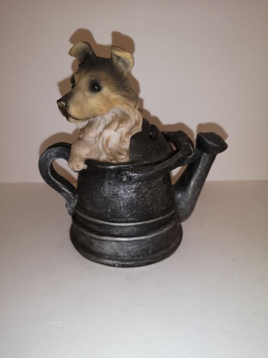 Skarbonka w kształcie pieska w konewce