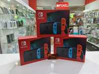 Нові Nintendo Switch with Neon Blue and Neon Red Joy-Con