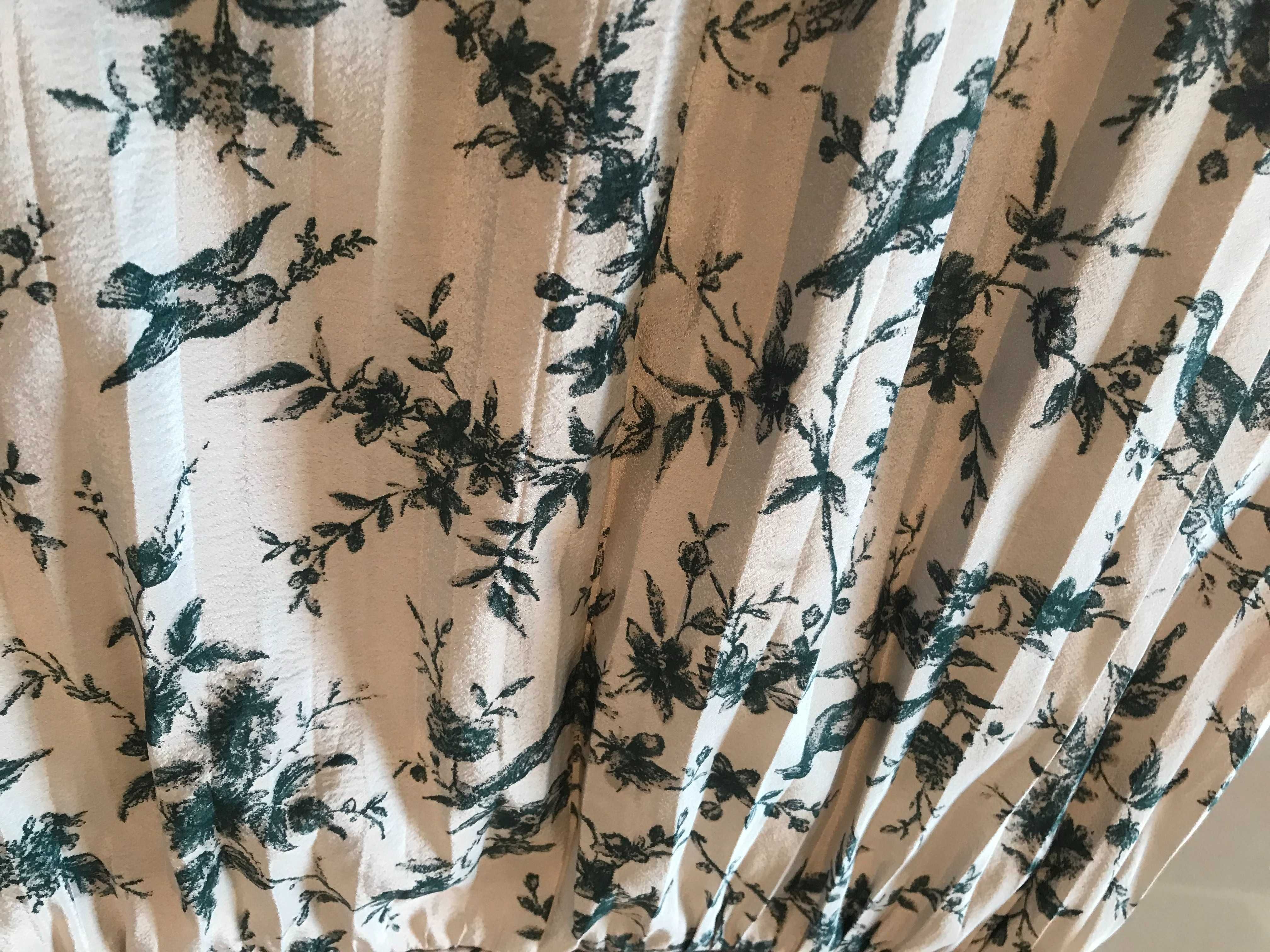 Długa plisowana spódnica od Snidel w pastelowe zielone wzory