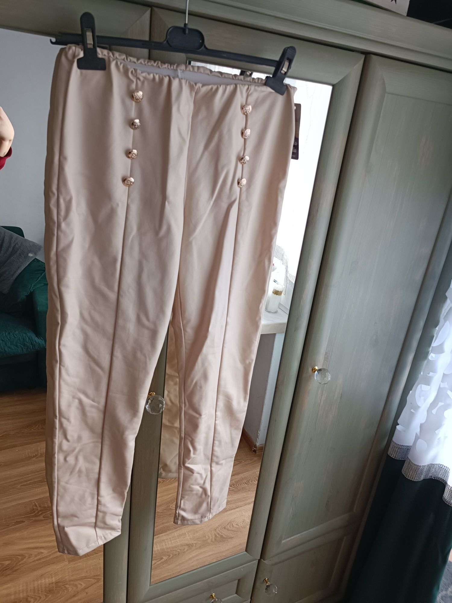 Nowe spodnie woskowane eleganckie ecru legginsy
