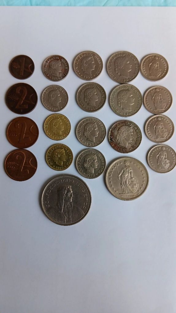 21 moedas de francos Suíços