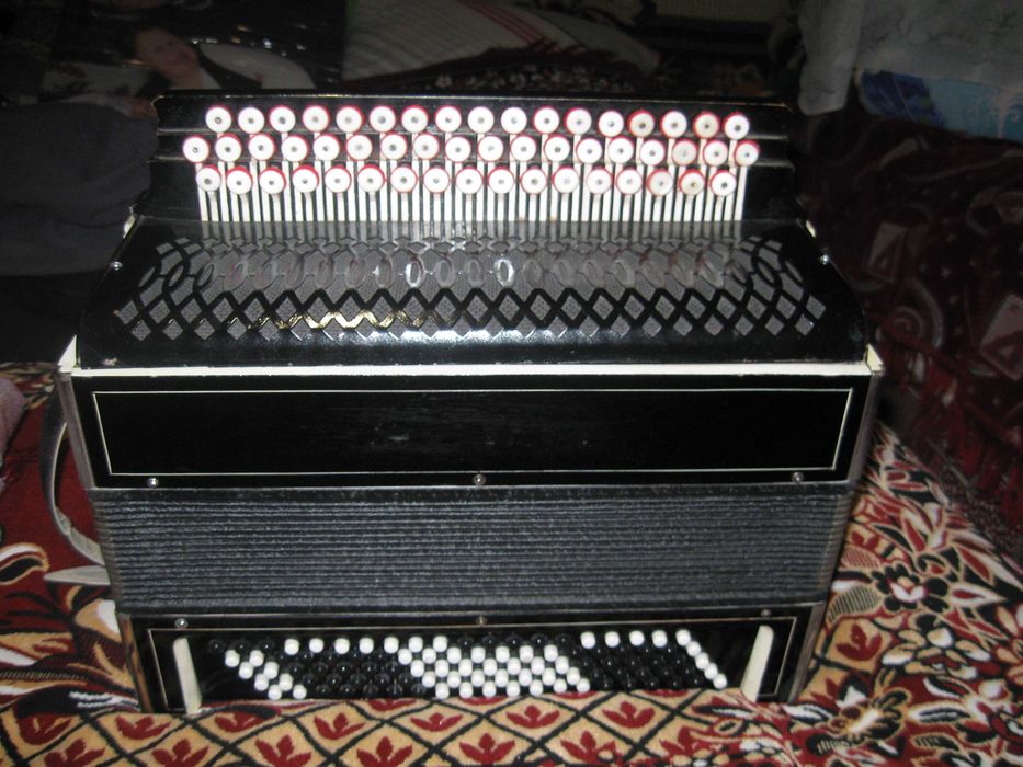 продам  баян  55 на 100 після  ремонту