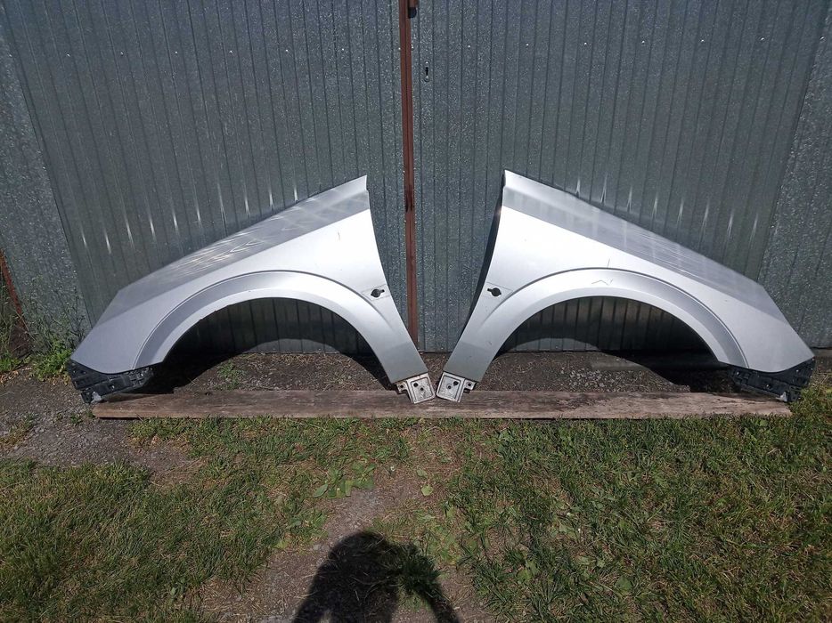 Opel vectra C LIFT Błotnik prawy przód L.P. srebrny Z157