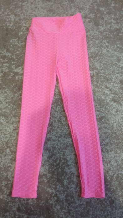 Яскраві рожеві легінси
