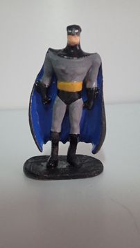 Boneco em chumbo "Batman" e "Batgirl"