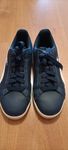 Tennis puma azuis escuros em pele