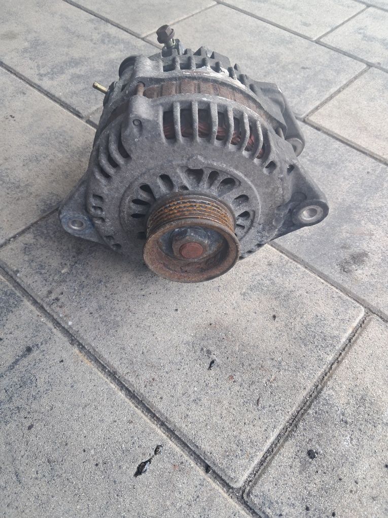 Alternator z Vacum pompą Opel Corsa C Diesel 1.7 DTI Rok 2003