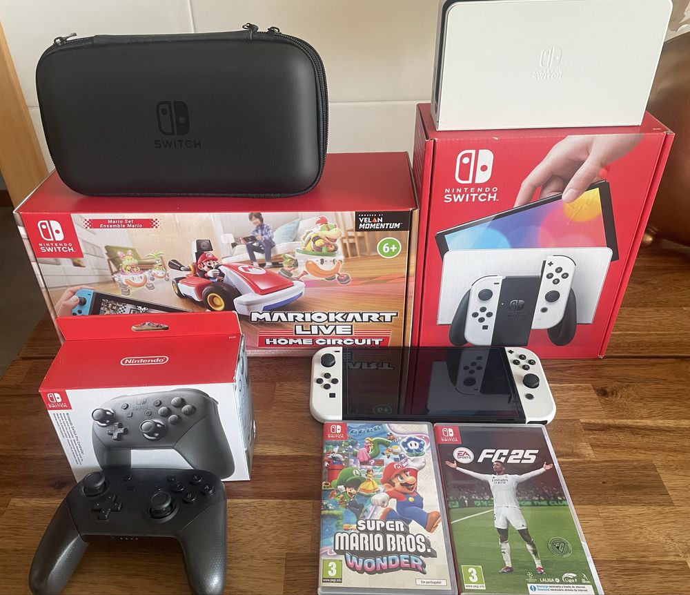 Nintendo switch oled com comando jogos e bolsa