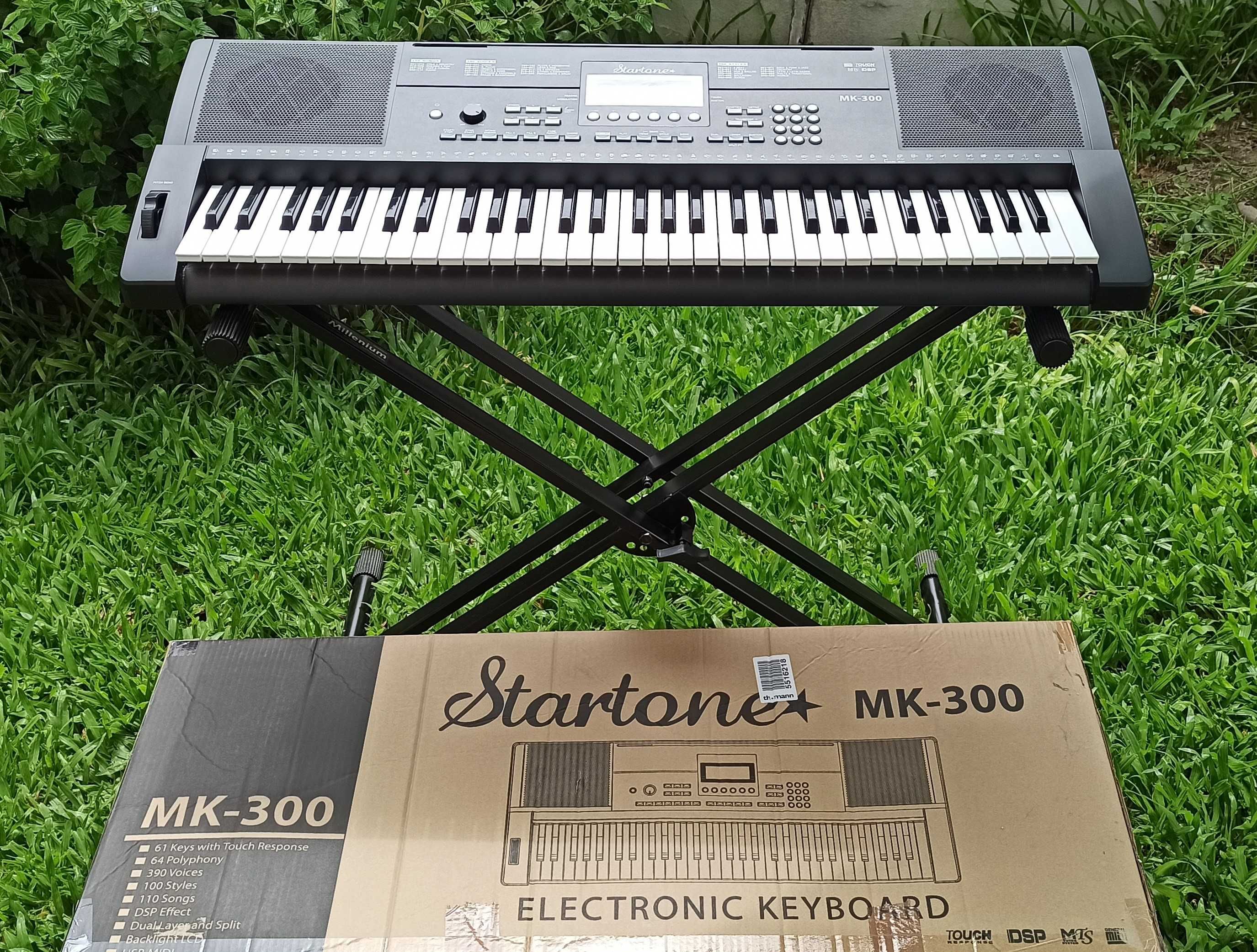 Teclado Startone MK-300, em embalagem, novo, com suporte incluído.