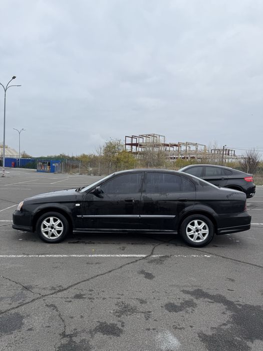 Шевроле еванда автомат шикарная комплектация