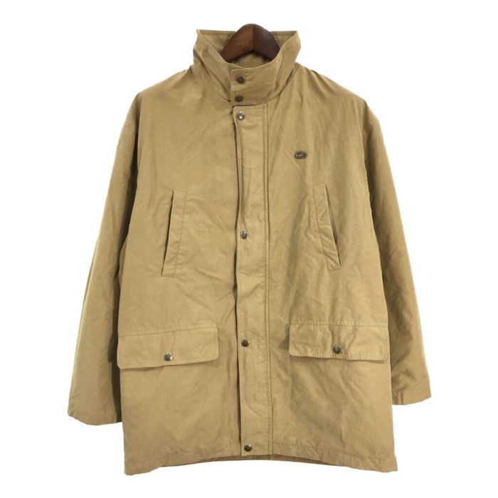 Демісезонна унісекс куртка lacoste бежевого кольору