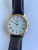 Relógio  Tissot clássico, números romanos