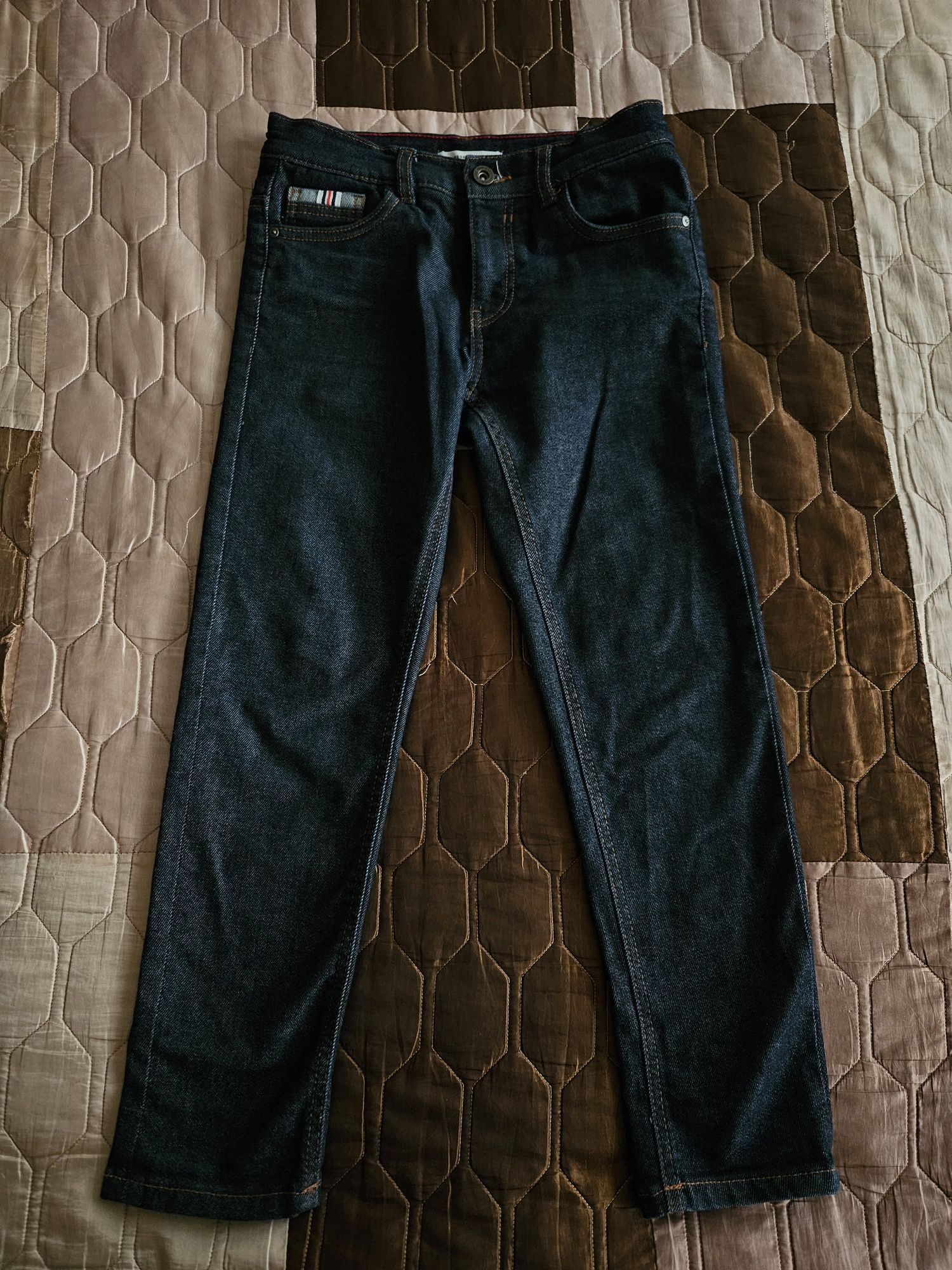 Spodni jeansowe Reserved 134r.