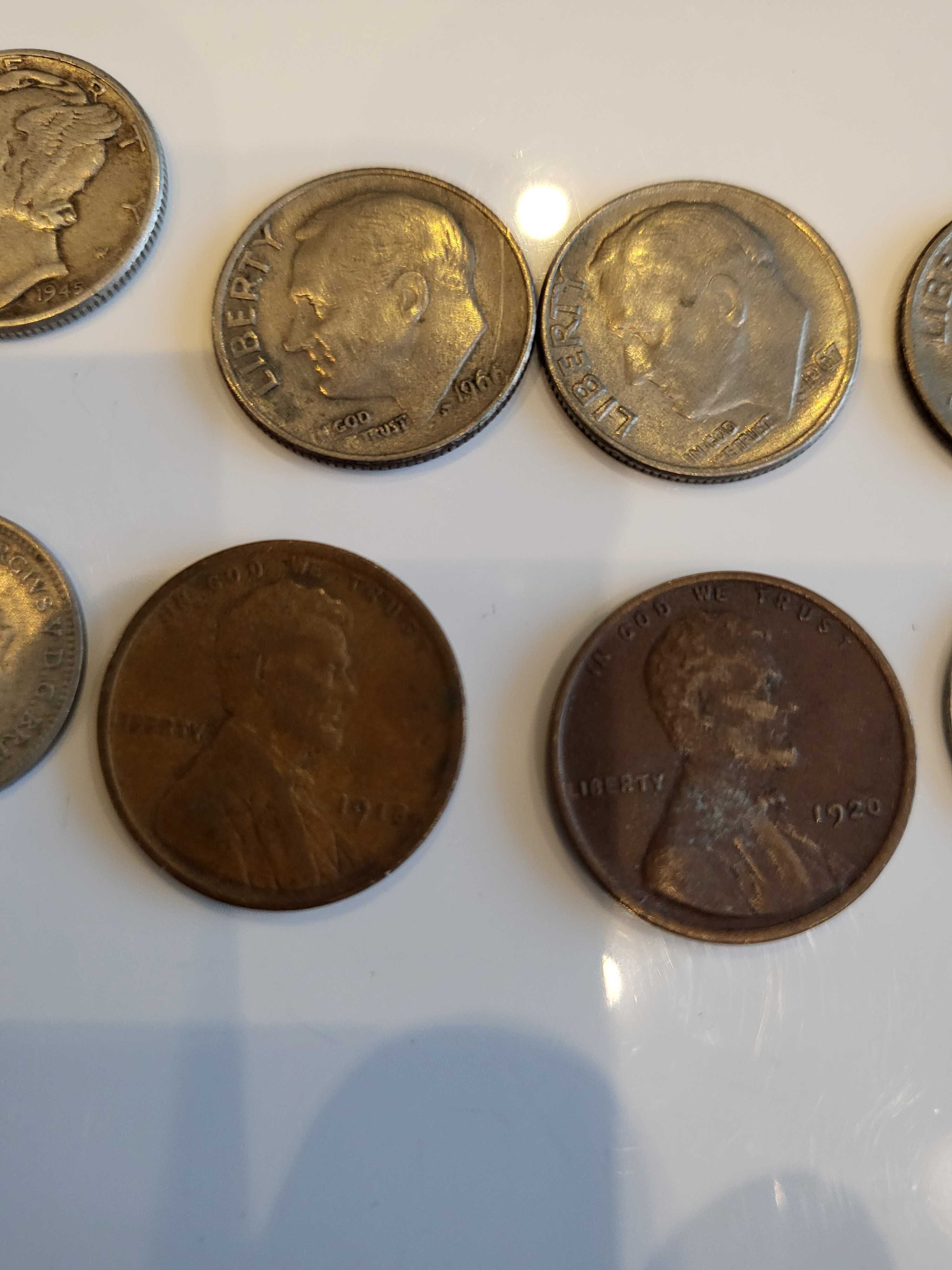 monety one dime , thre pence , one dime