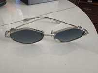 Oculos de sol em titanio