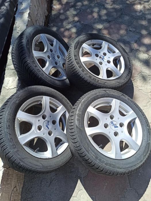 Felgi aluminiowe od Forda 14 cali z oponami