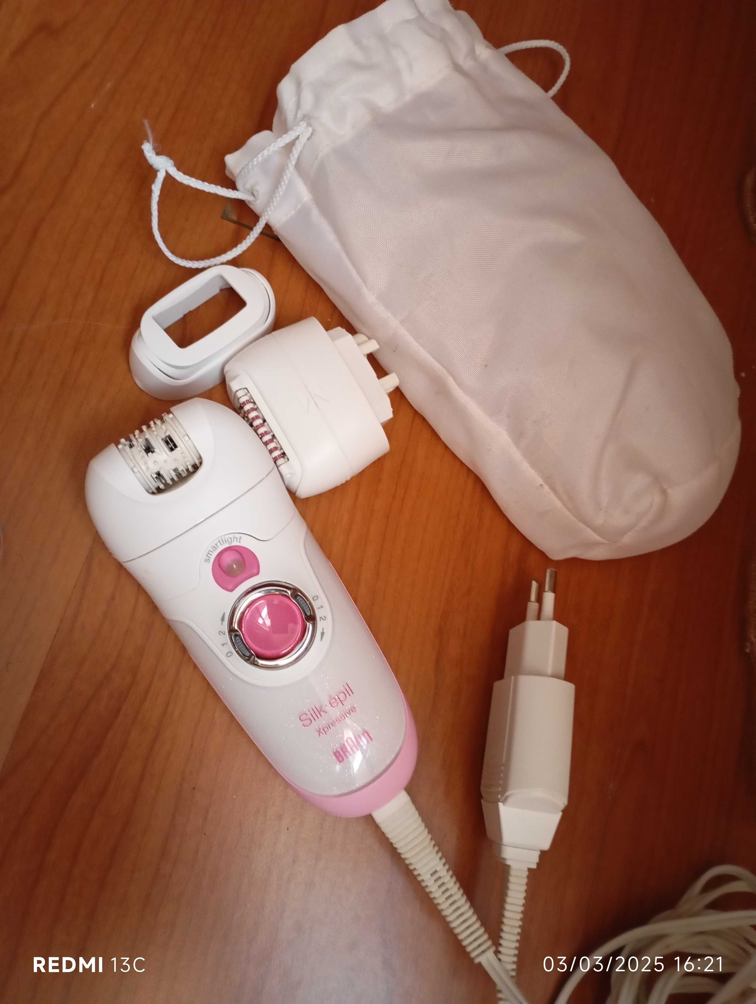Depiladora com acessórios e bolsa