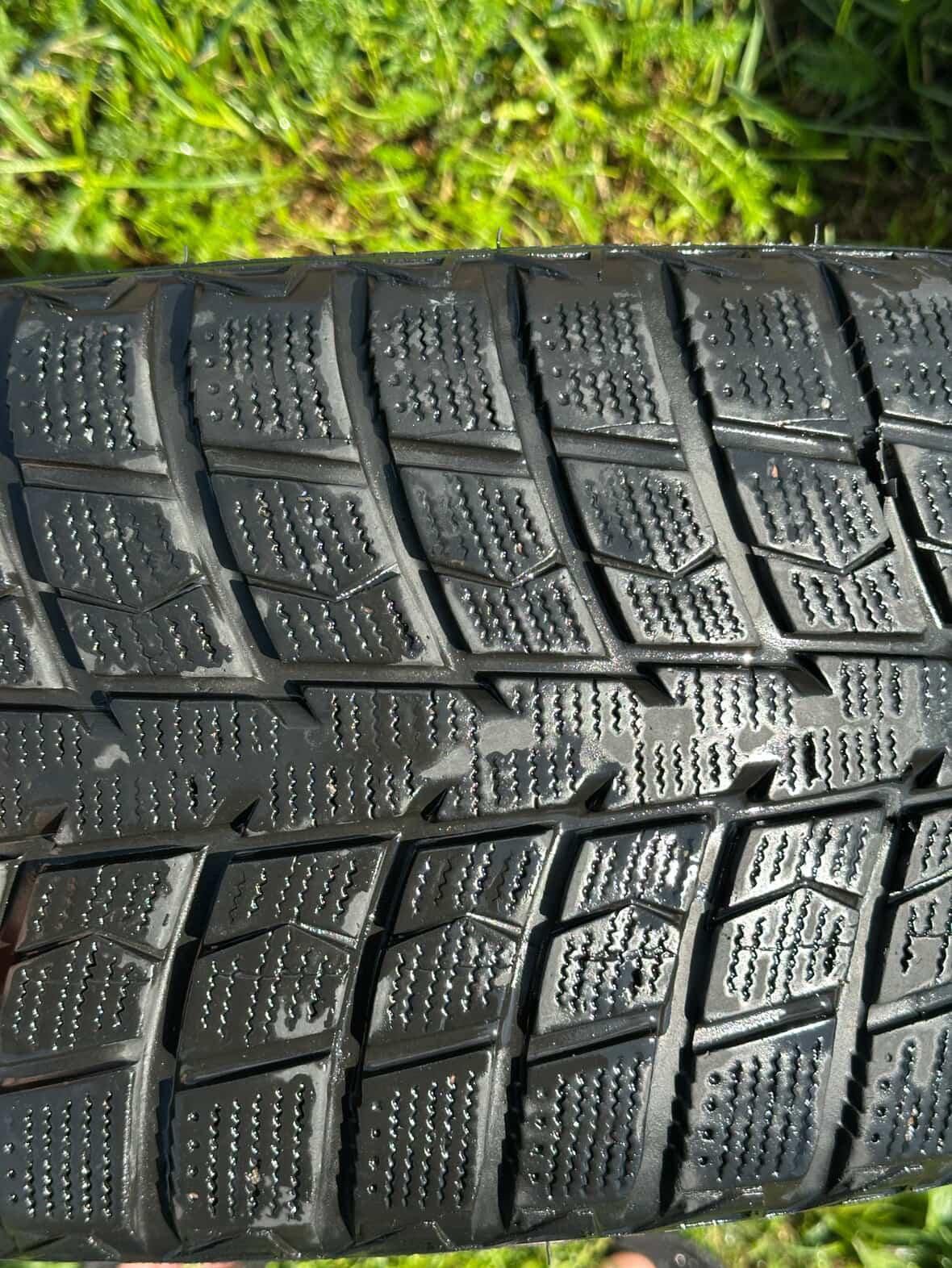 Продам 4 диска з резиною на  Wolksvagen  r18