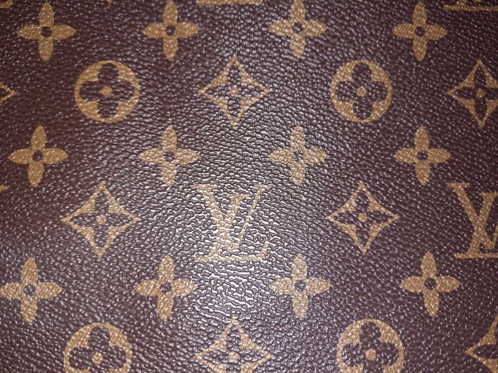 Портфель-сумка Louis Vuitton.