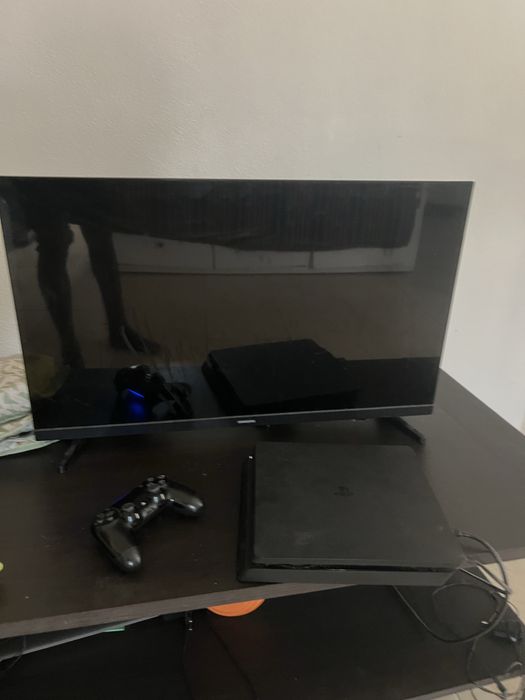 Tv 32 polegadas mais playstations 4 com 1T e 2 comandos