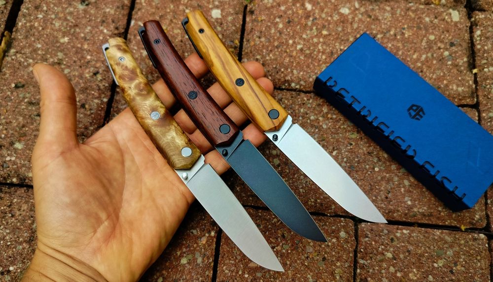 Nóż Petrified Fish 719 drewno