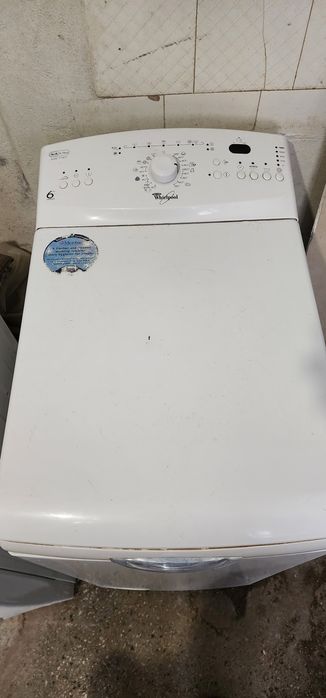 Whirlpool пральна машина з вертикальним завантаженням