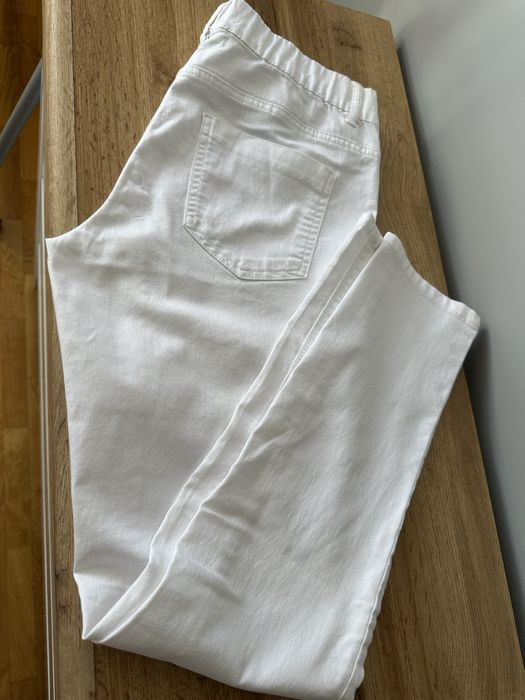 Białe spodnie z bawełny typu jeggins