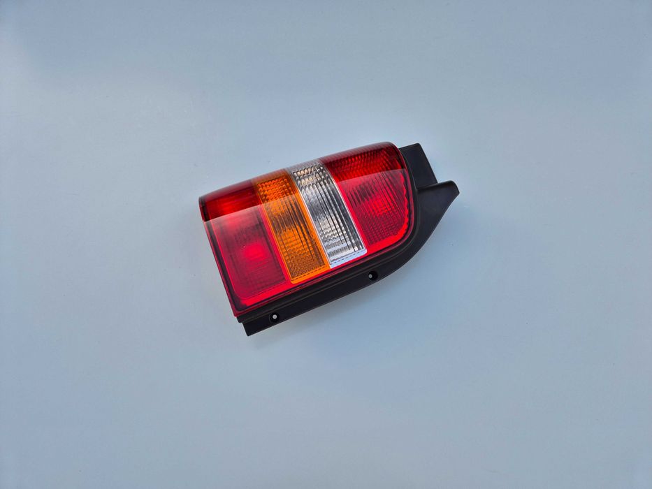 Lewa Tylna Tył Kompletna Lampa VW Transporter T5 Oryginał Europa