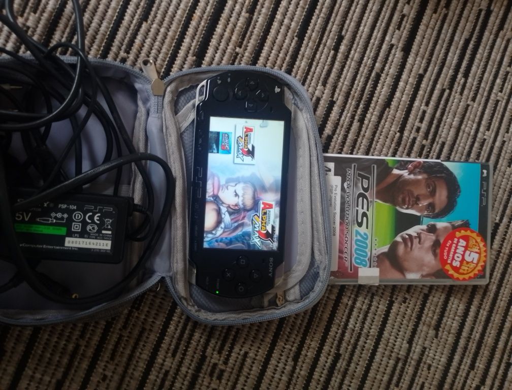 PSP com jogos e bolso