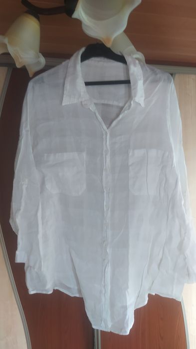 Sprzedam Pakę ubrań damskich rozm.50.Trzy sukienki i dwie bluzki.