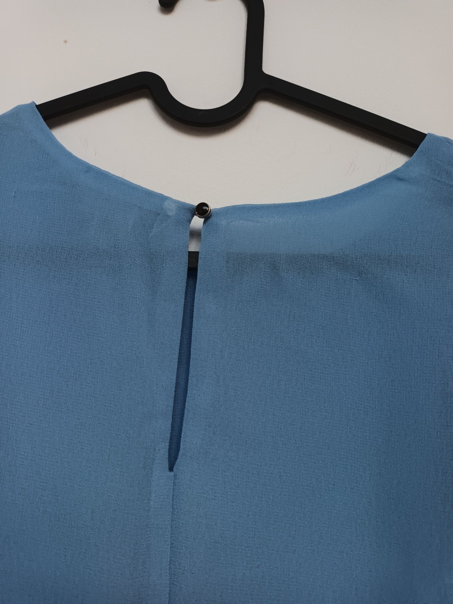 Blusa azul como nova