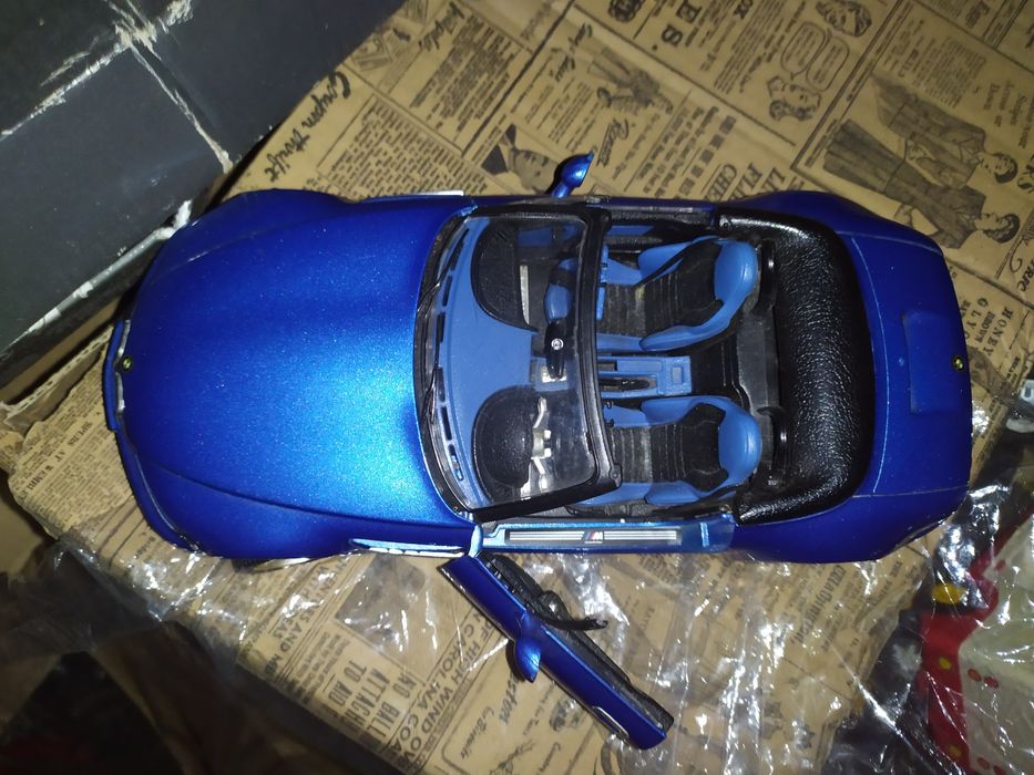 Model samochodu BMW skala 1:18 od burago rezerwacja