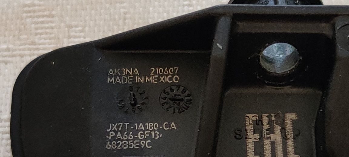 Czujnik ciśnienia opon Ford TPMS JX7T-1A180-CA FORD