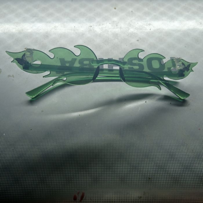 Зельоные очки види огоньков