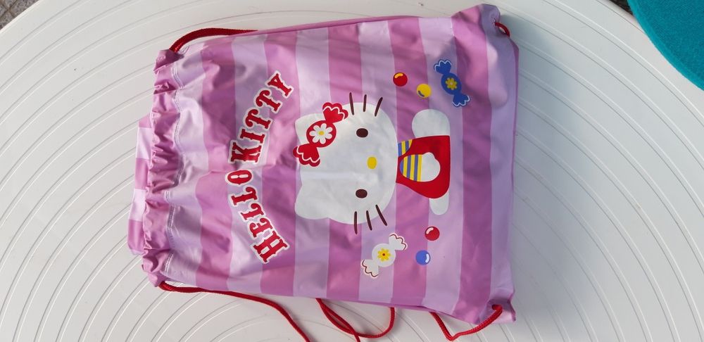 Impermeável e Saco - 8 anos Novo