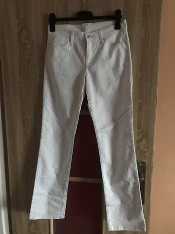 Biale spodnie jeansy 38