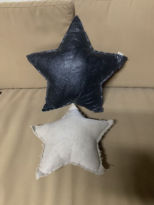 Almofadas em forma de estrela para quarto criança