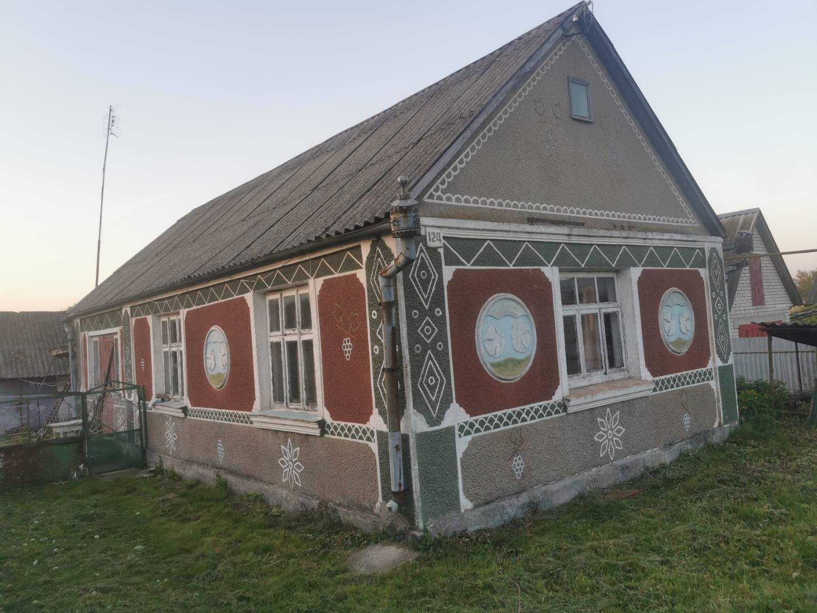 Продається земельна ділянка з будинком на центральній вулиці Торчина