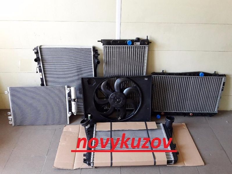 Радиатор охлаждения кондиционера Nissan Almera Classic