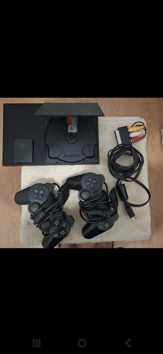 Vendo esta playstatoin 2 com a fita partida