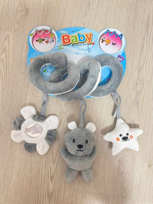 Іграшка на коляску, ліжко