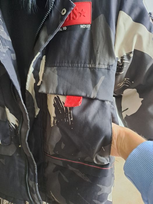 Зимова куртка на хлопчика 134-140р.