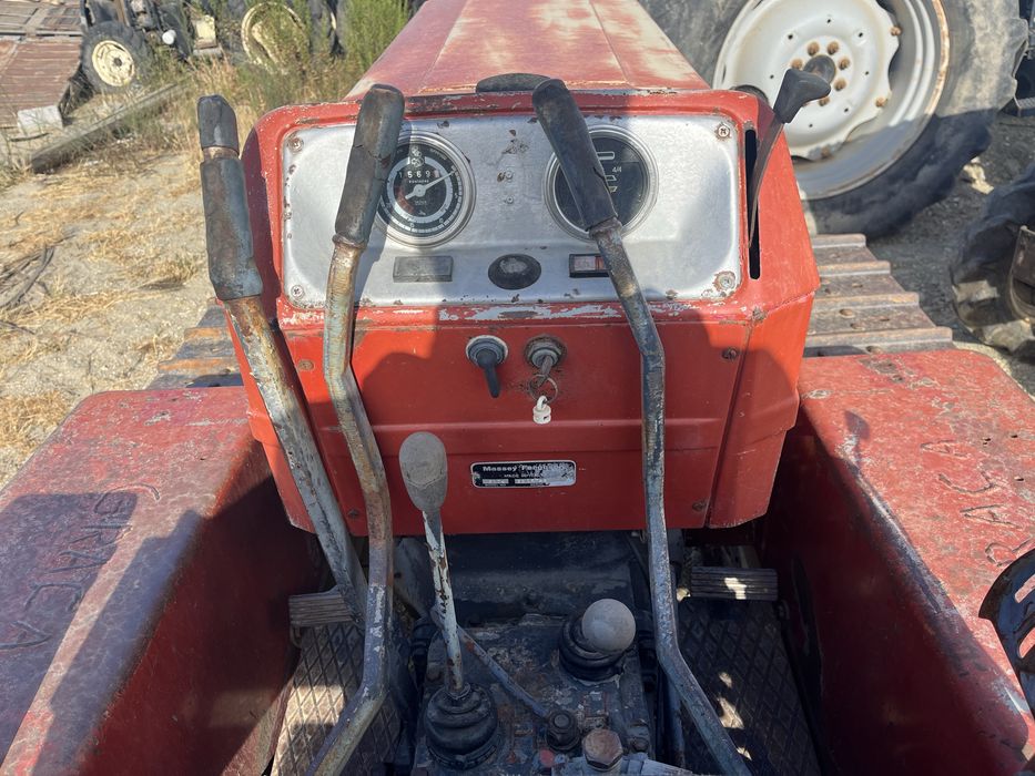 Trator rastos mf 174c usado