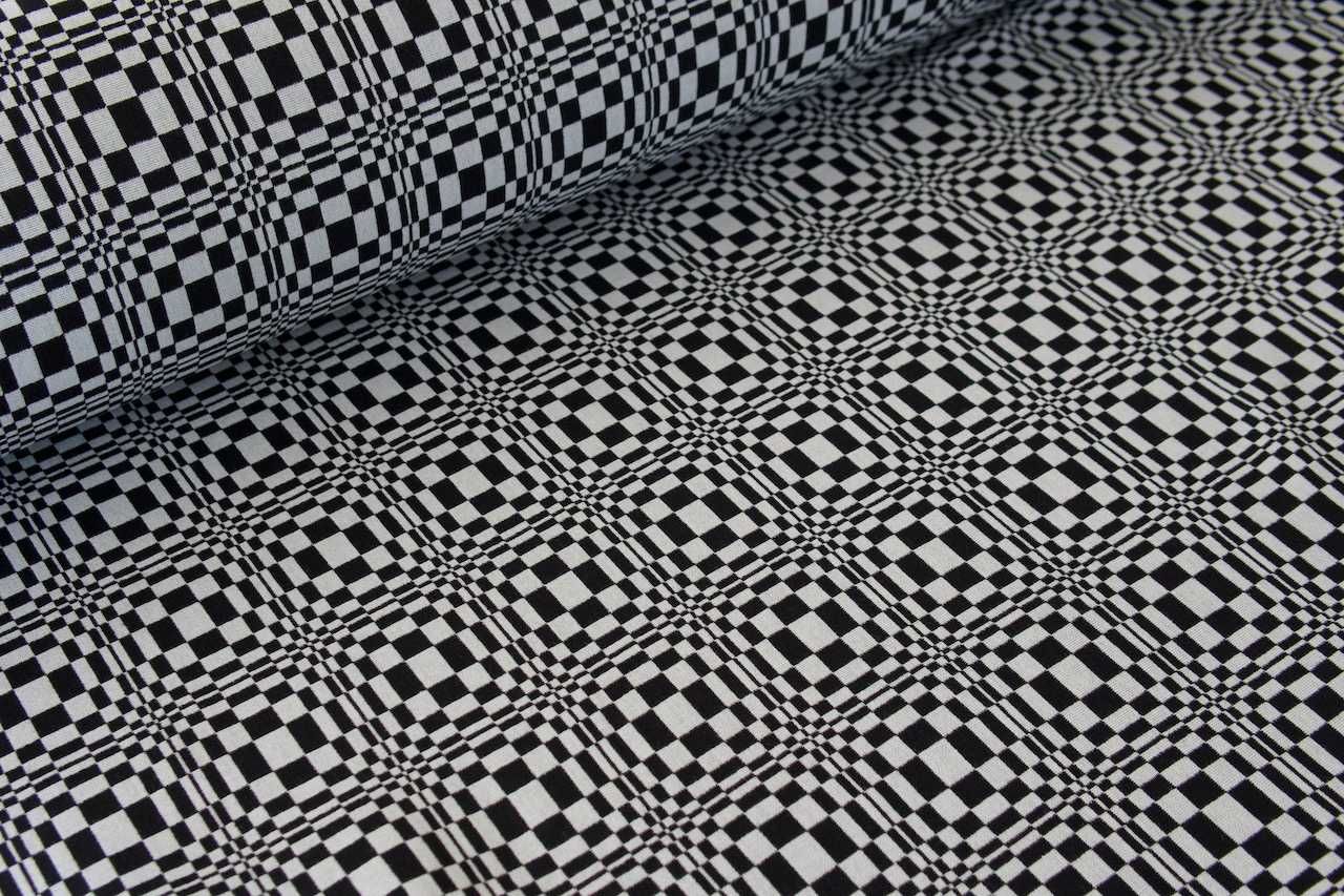 Czarno-biała tkanina w ciekawy geometryczny wzór