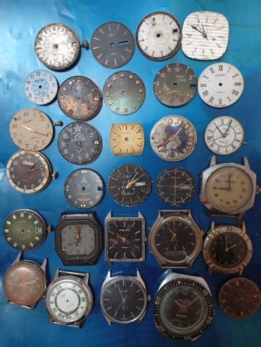 Запчастини годинників, корпуса, механізми, циферблати бу.